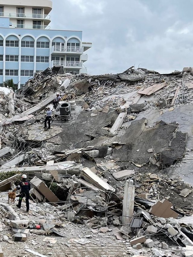 Crews spend Independence Day loading explosive charges to safely bring down the rest of Surfside condo
